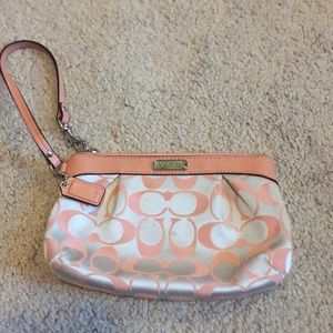 Coach wristlet peach and silver gently used bag